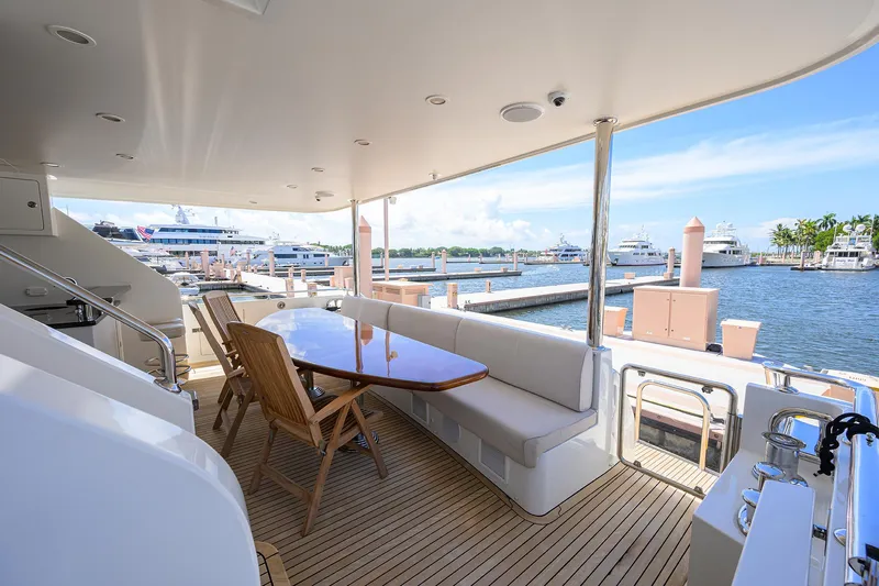 2013 - 90 Oa Skylounge Yacht Photos Pics Luxurious 2013 Ocean Alexander Sky Lounge yacht deck with seating, overlooking marina.
