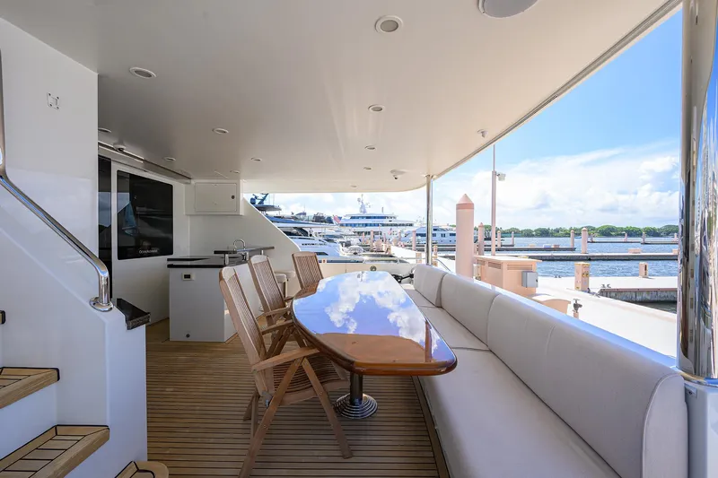 Claypen Yacht Photos Pics Luxurious 2013 Ocean Alexander Sky Lounge yacht deck with seating and ocean view.