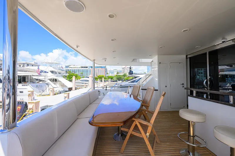 Claypen Yacht Photos Pics Luxurious 2013 Ocean Alexander Sky Lounge yacht deck with seating and marina view.