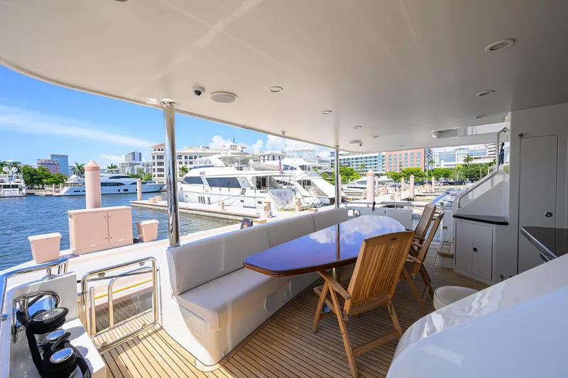 Claypen Yacht Photos Pics Luxurious 2013 Ocean Alexander Sky Lounge yacht with elegant outdoor seating and marina view.