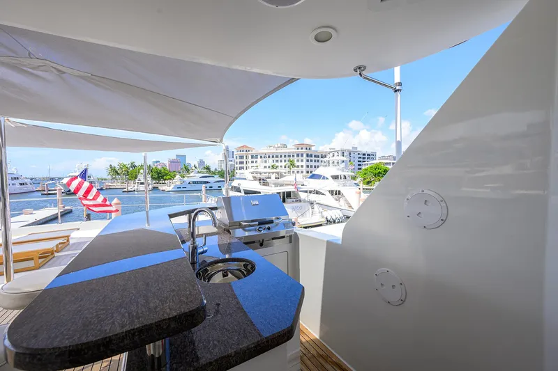 Claypen Yacht Photos Pics Luxurious 2013 Ocean Alexander Sky Lounge yacht with outdoor kitchen and marina view.