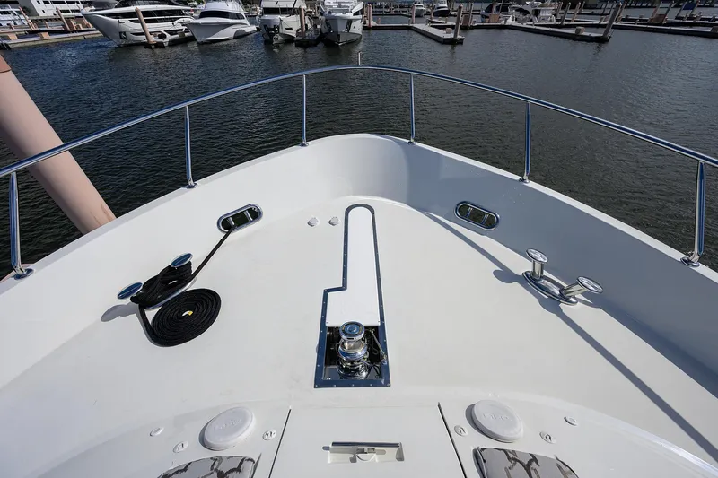 Claypen Yacht Photos Pics Bow view of 2013 Ocean Alexander Sky Lounge yacht docked at marina.