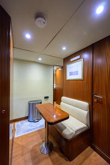 Claypen Yacht Photos Pics Luxurious 2013 Ocean Alexander Sky Lounge interior with wood paneling and cozy seating area.