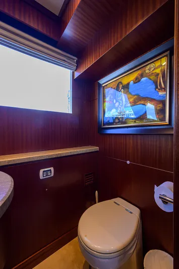 Claypen Yacht Photos Pics Luxurious bathroom in 2013 Ocean Alexander Sky Lounge yacht with elegant wood paneling and artwork.