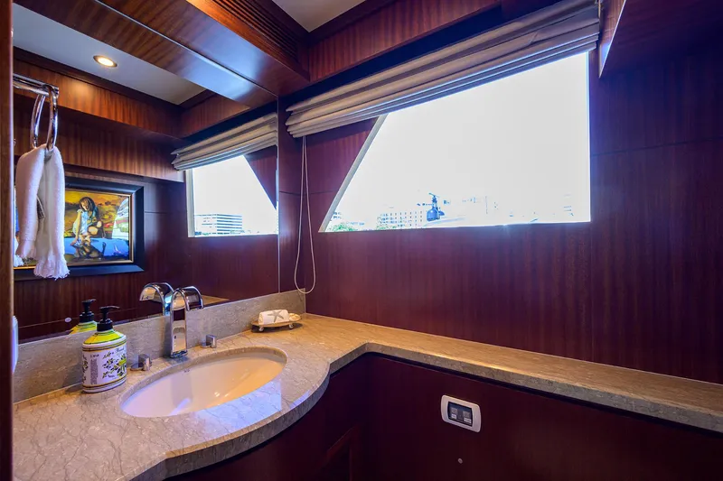 Claypen Yacht Photos Pics Luxurious bathroom interior of 2013 Ocean Alexander Sky Lounge yacht with elegant wood finish.