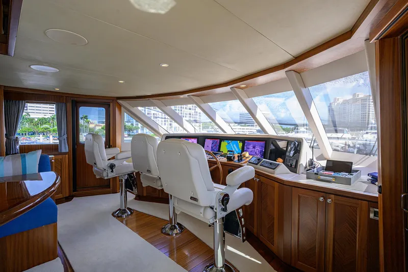 Claypen Yacht Photos Pics Luxurious 2013 Ocean Alexander Sky Lounge yacht interior with helm and panoramic windows.