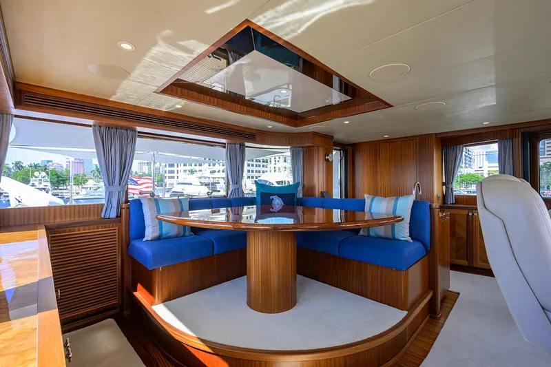 Claypen Yacht Photos Pics Luxurious 2013 Ocean Alexander Sky Lounge interior with elegant wood and blue seating.