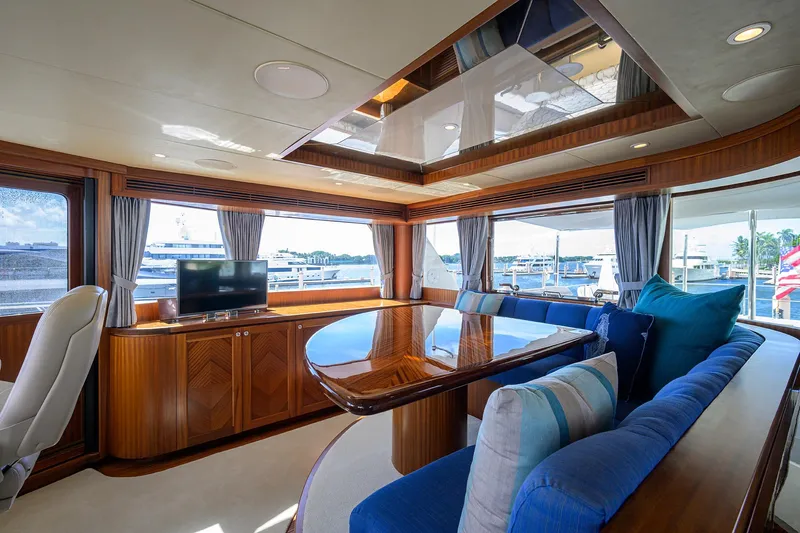 Claypen Yacht Photos Pics Luxurious interior of 2013 Ocean Alexander Sky Lounge yacht with elegant wood finishes and plush seating.