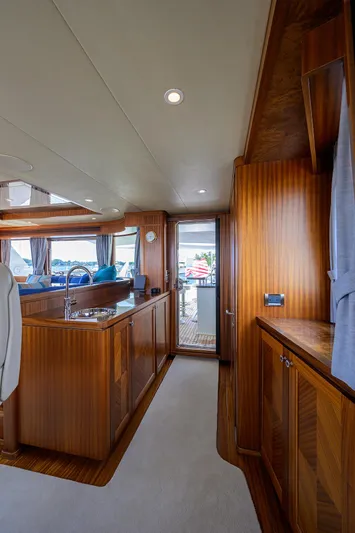 Claypen Yacht Photos Pics Luxurious 2013 Ocean Alexander Sky Lounge interior with elegant wood finishes and modern amenities.