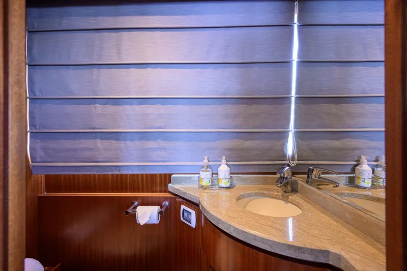 Claypen Yacht Photos Pics Luxurious bathroom in 2013 Ocean Alexander Sky Lounge yacht with elegant fixtures and modern design.