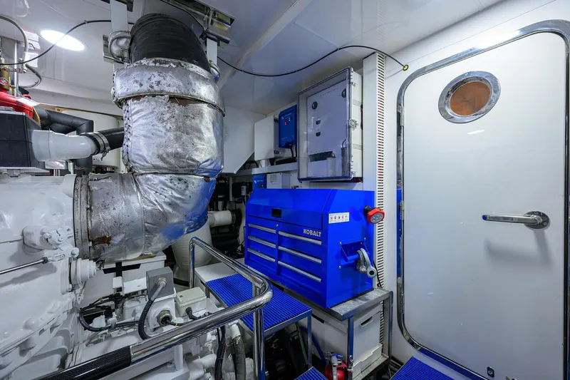 Claypen Yacht Photos Pics Engine room of 2013 Ocean Alexander Sky Lounge yacht, featuring machinery and equipment.