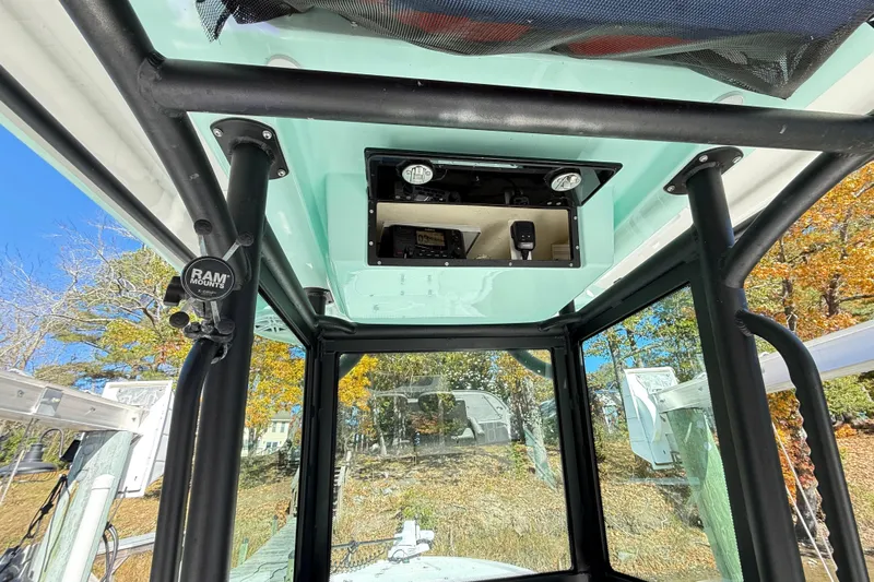  Yacht Photos Pics Interior view of 2023 Caymas 281 HB boat with mounted equipment and clear windows.