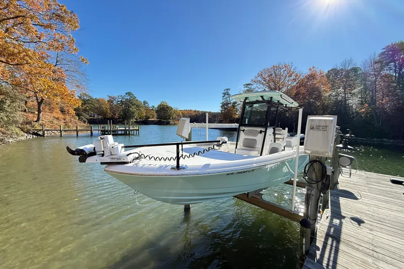  Yacht Photos Pics 2023 Caymas 281 HB boat docked on a sunny autumn day by the lake.