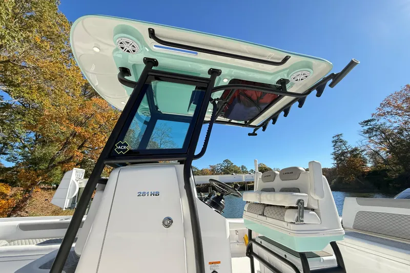  Yacht Photos Pics 2023 Caymas 281 HB boat with sleek design and modern features on a sunny day.