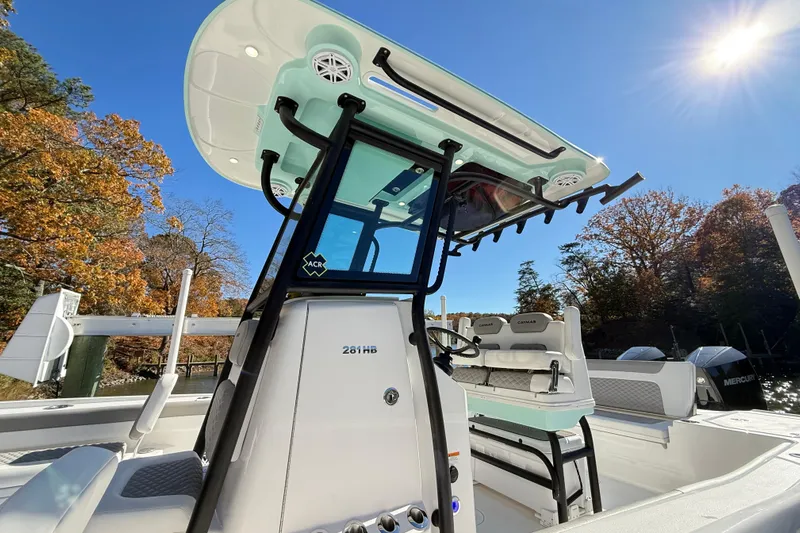  Yacht Photos Pics 2023 Caymas 281 HB boat with sleek design, set against a sunny autumn backdrop.