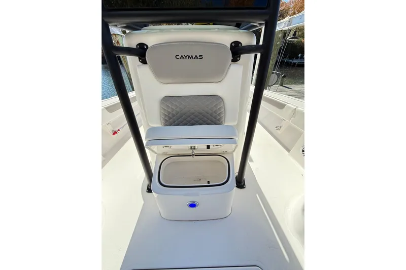  Yacht Photos Pics 2023 Caymas 281 HB boat interior with seating and storage compartment.