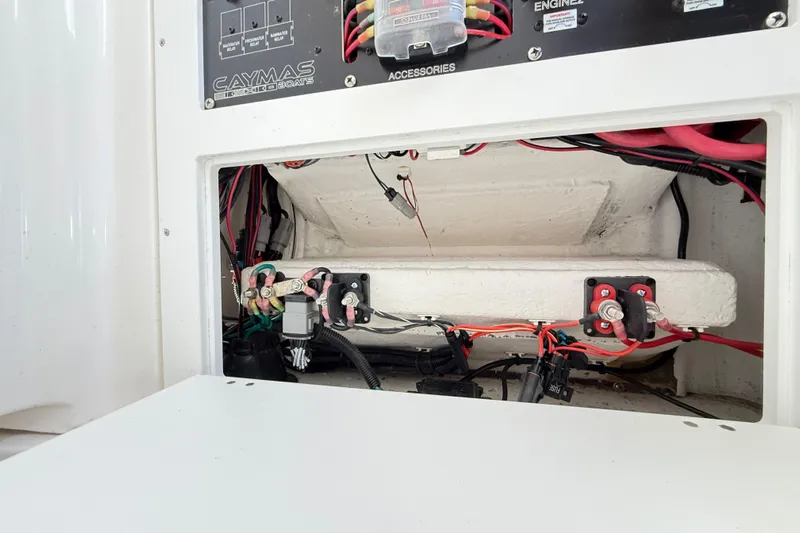  Yacht Photos Pics 2023 Caymas 281 HB boat electrical panel with wiring and components.