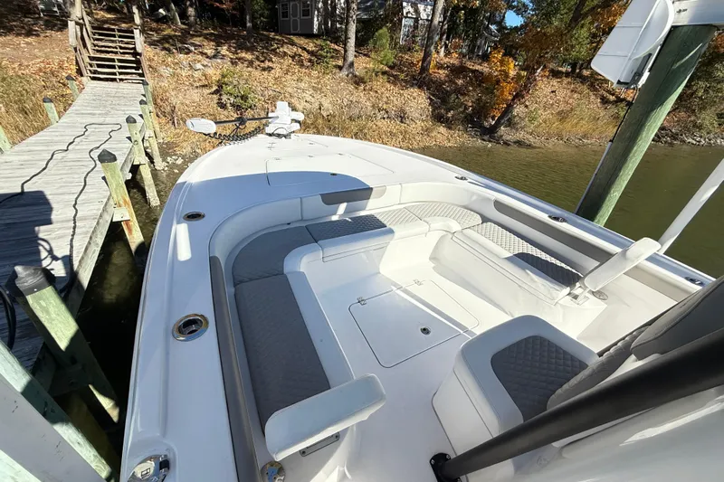  Yacht Photos Pics 2023 Caymas 281 HB boat docked, featuring spacious seating and modern design.