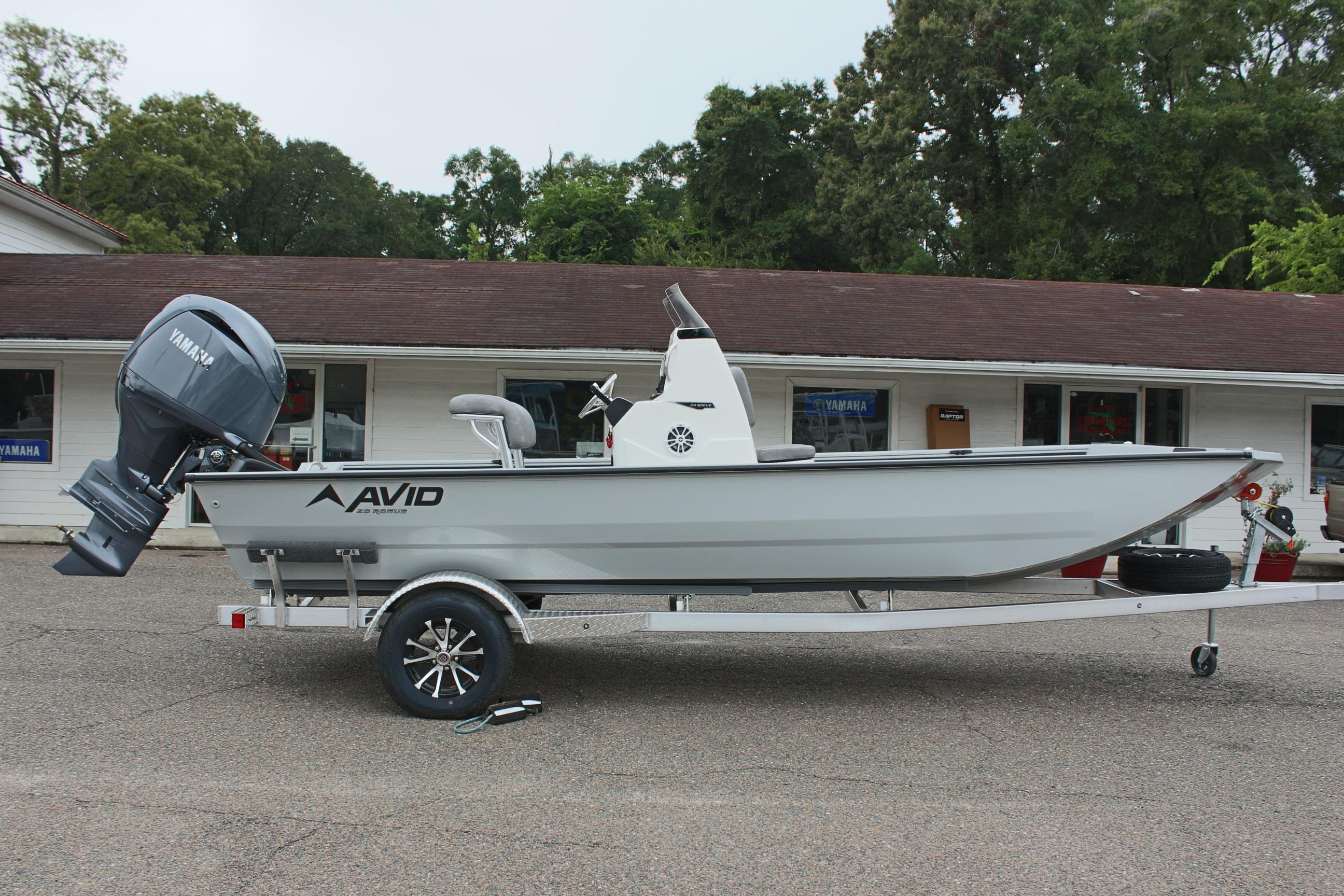 2026 Avid 20 Rogue CC boat on trailer with Yamaha outboard motor, parked outdoors.