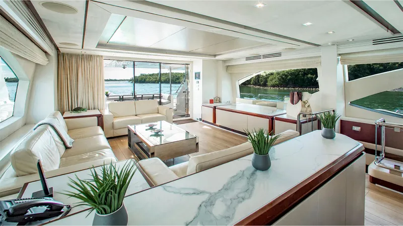 Bt2 Yacht Photos Pics Luxurious interior of 2010 Azimut 95 yacht with elegant furnishings and scenic views.