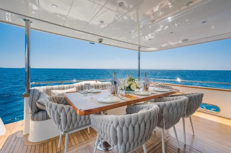 Getaway Yacht Photos Pics Luxurious dining area on Gianetti Navetta 67 yacht, 2012, with ocean view.