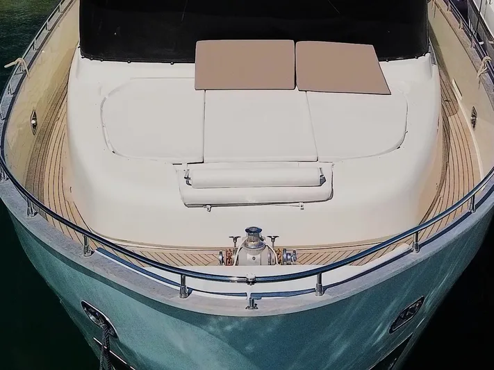 Getaway Yacht Photos Pics Gianetti Navetta 67 yacht deck, 2012 model, featuring spacious sunbathing area.