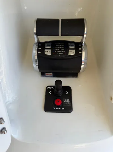 Getaway Yacht Photos Pics Control panel of a 2012 Gianetti Navetta 67 yacht with thruster and throttle levers.