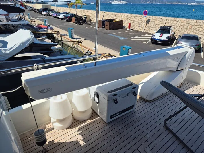 Getaway Yacht Photos Pics Deck of 2012 Gianetti Navetta 67 yacht with equipment and scenic marina view.