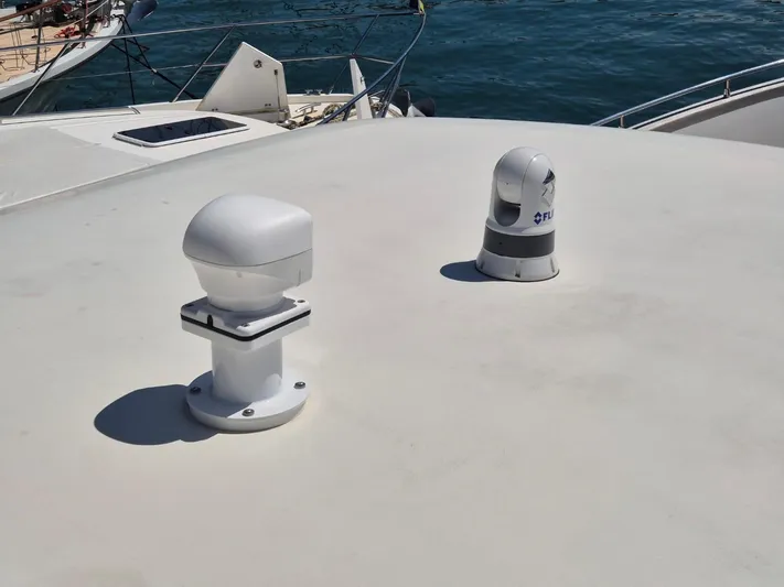 Getaway Yacht Photos Pics Rooftop equipment on Gianetti Navetta 67 yacht, 2012 model, with ocean background.