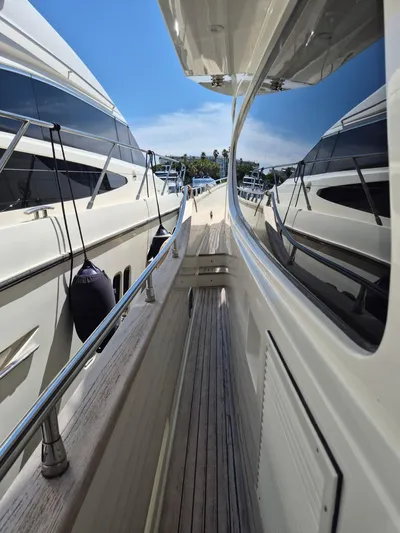 Getaway Yacht Photos Pics Side view of 2012 Gianetti Navetta 67 yacht with sleek design and reflective windows.