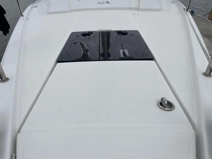 Silver Alert Yacht Photos Pics Deck of 2021 Hanse 418 sailboat with hatch and fittings.