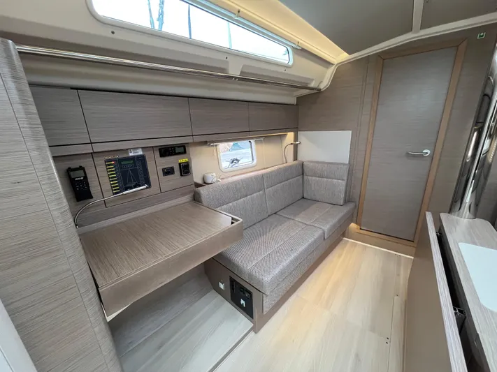 Silver Alert Yacht Photos Pics 2021 Hanse 418 yacht interior with modern seating and navigation equipment.