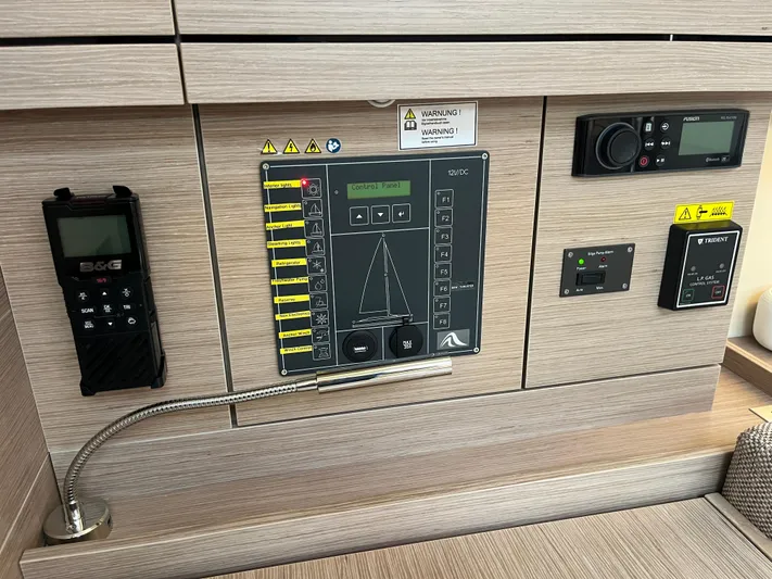 Silver Alert Yacht Photos Pics Control panel of a 2021 Hanse 418 yacht with navigation and communication systems.