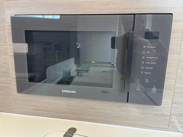 Silver Alert Yacht Photos Pics Built-in Samsung microwave in a Hanse 418 yacht kitchen, 2021 model.