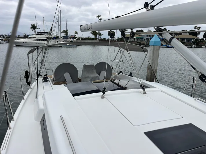 Silver Alert Yacht Photos Pics 2021 Hanse 418 yacht docked in a marina with overcast skies.