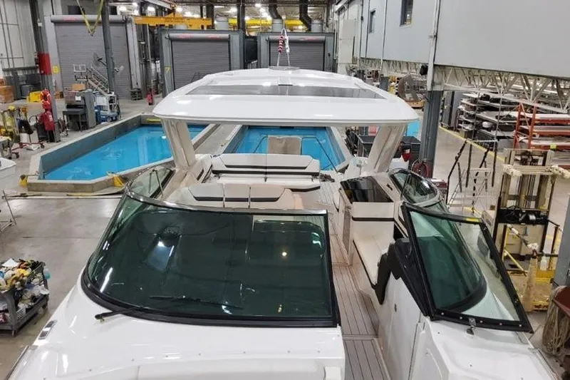  Yacht Photos Pics 2026 Formula 360 Crossover Bowrider I/O in a manufacturing facility, showcasing sleek design.