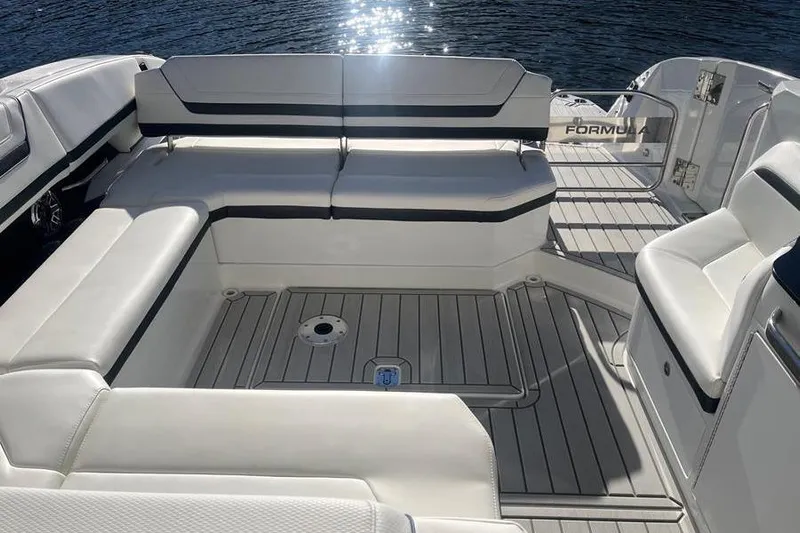  Yacht Photos Pics Luxurious seating on 2026 Formula 360 Crossover Bowrider I/O, with sleek design and waterfront view.