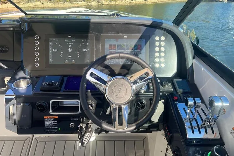  Yacht Photos Pics 2026 Formula 360 Crossover Bowrider I/O dashboard with modern controls and steering wheel.