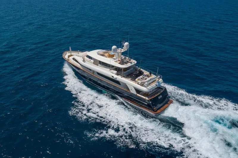 Hag Yacht Photos Pics Luxurious 2007 Custom Line Navetta 30 yacht cruising on open sea.