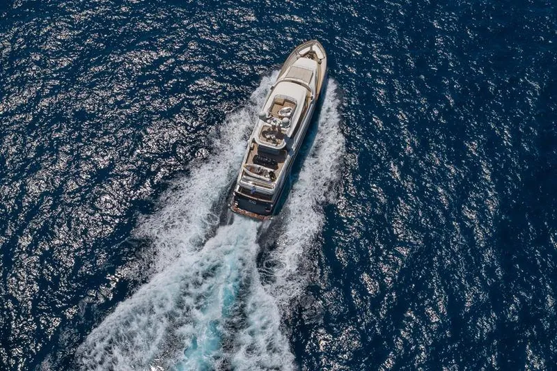 Hag Yacht Photos Pics Aerial view of 2007 Custom Line Navetta 30 yacht cruising in open sea.