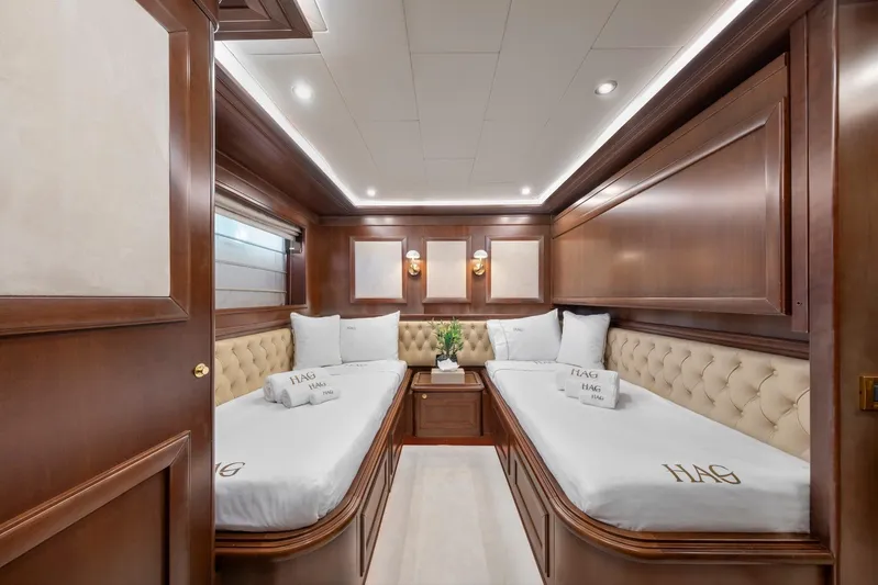 Hag Yacht Photos Pics Luxurious twin cabin with wood paneling on 2007 Custom Line Navetta 30 yacht.