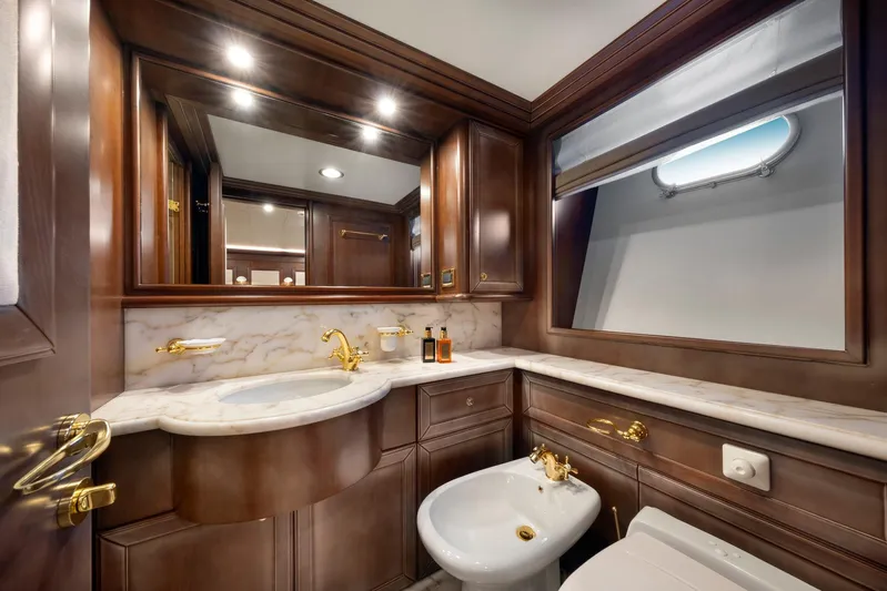 Hag Yacht Photos Pics Luxurious yacht bathroom with marble countertops and gold fixtures, Custom Line Navetta 30, 2007.