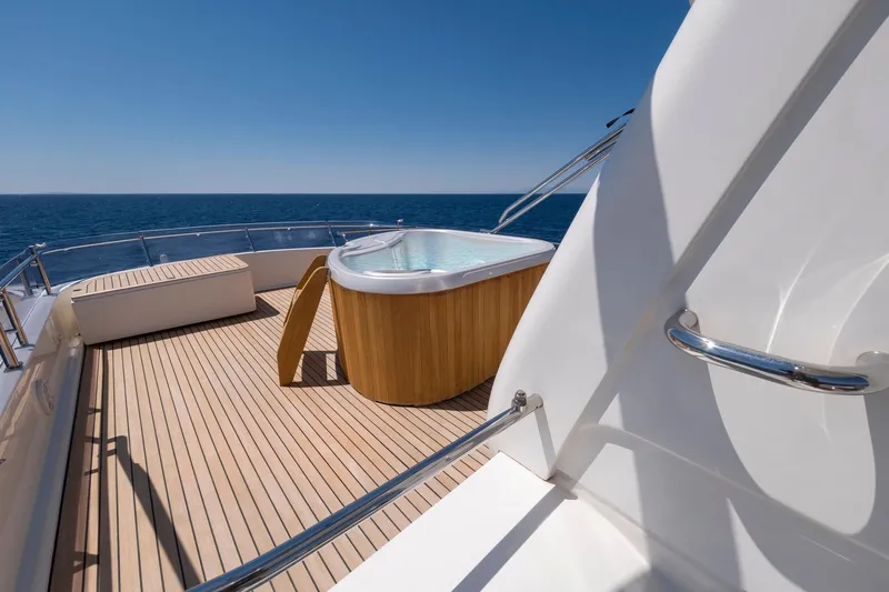 Hag Yacht Photos Pics Luxury yacht deck with hot tub, Custom Line Navetta 30, 2007 model, ocean view.