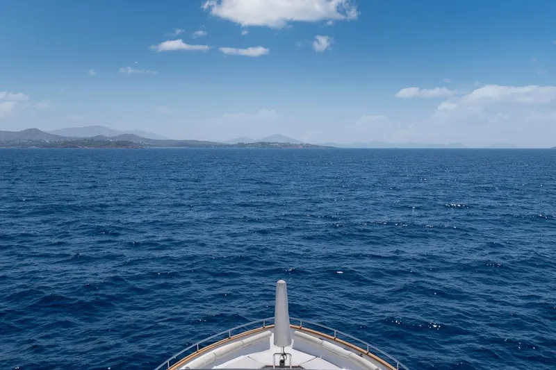 Hag Yacht Photos Pics Bow of Custom Line Navetta 30 yacht cruising on open sea, 2007 model.