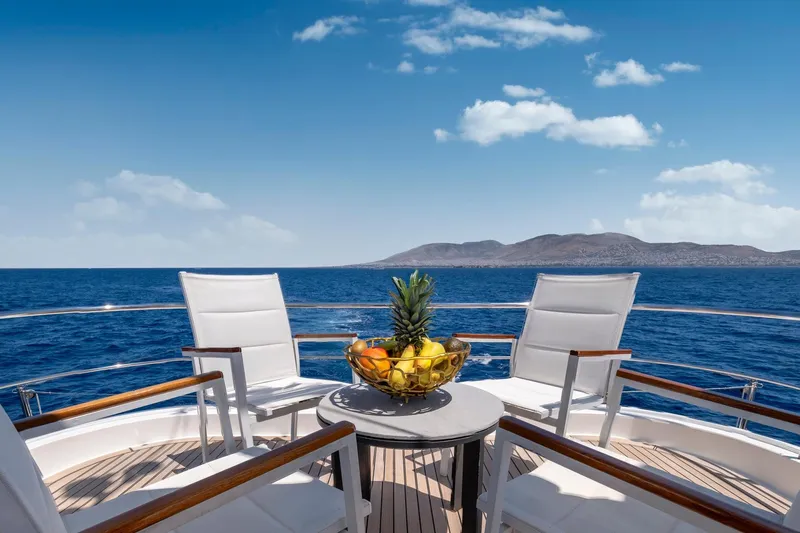 Hag Yacht Photos Pics Luxurious deck of 2007 Custom Line Navetta 30 yacht with ocean view and fruit bowl.