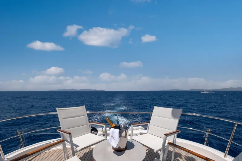 Hag Yacht Photos Pics Luxury yacht deck view with chairs and champagne, Custom Line Navetta 30, 2007 model.