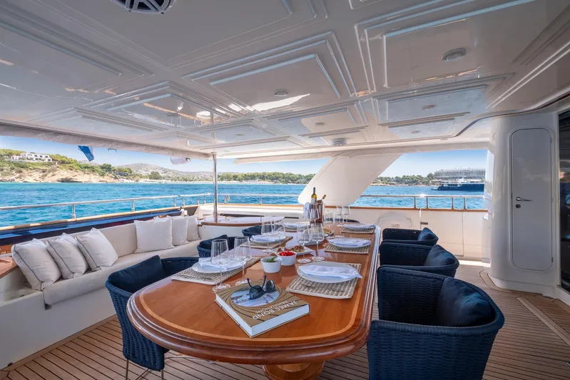 Hag Yacht Photos Pics Luxurious dining area on 2007 Custom Line Navetta 30 yacht with ocean view.
