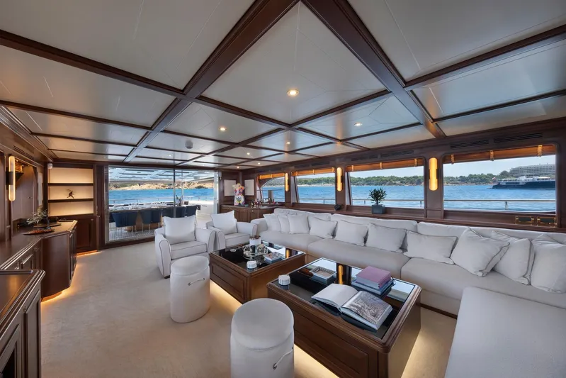 Hag Yacht Photos Pics Luxurious interior of 2007 Custom Line Navetta 30 yacht with elegant seating and ocean view.
