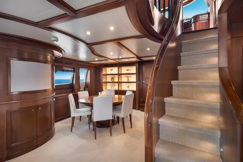 Hag Yacht Photos Pics Luxurious interior of 2007 Custom Line Navetta 30 yacht with elegant dining area and staircase.