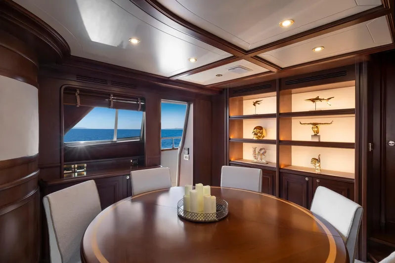 Hag Yacht Photos Pics Luxurious interior of 2007 Custom Line Navetta 30 yacht with elegant wood finishes.